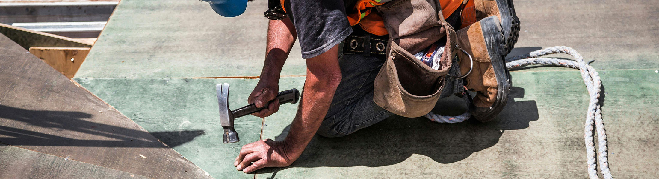 image of work being done on a roof.