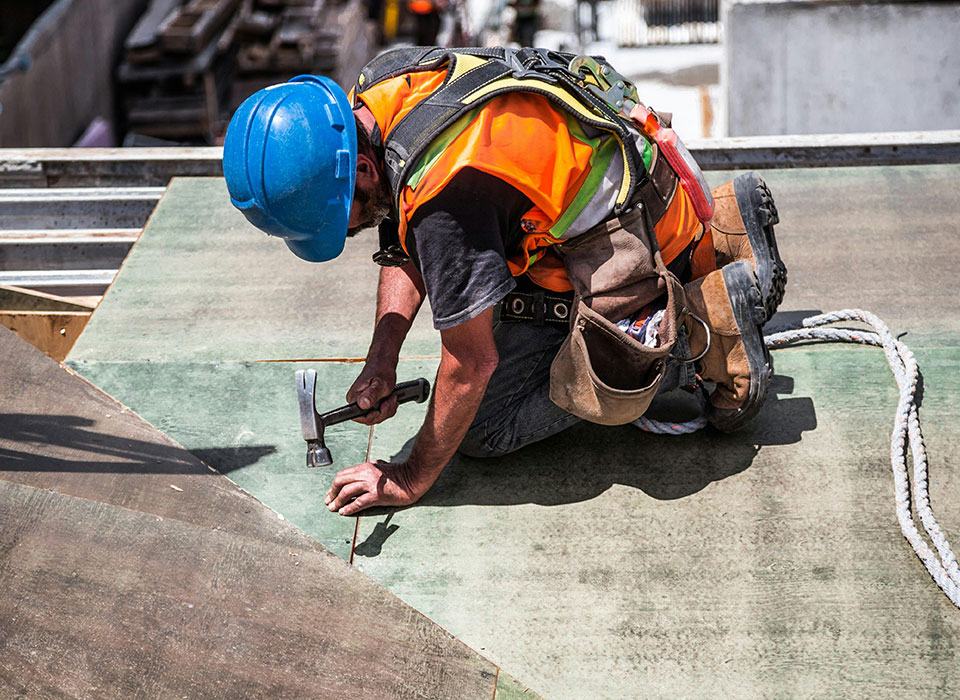 image of work being done on a roof.